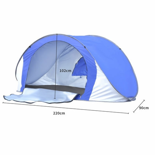 wIMINIS instant beach tent folded flat inside its circular black carry bag.
