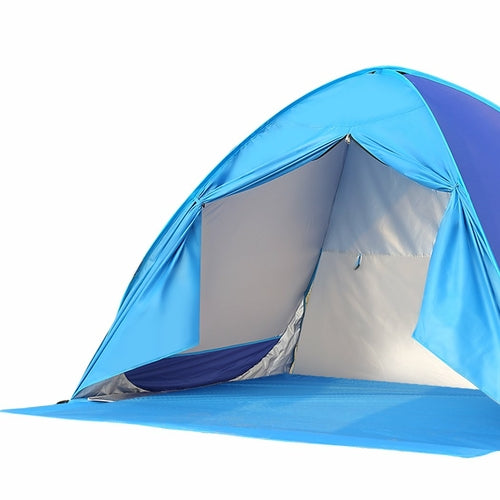 WIMINIS pop-up tent folded flat inside its circular black carry bag.