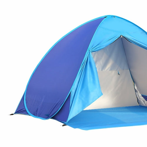 WIMINIS pop-up tent folded flat inside its circular black carry bag.