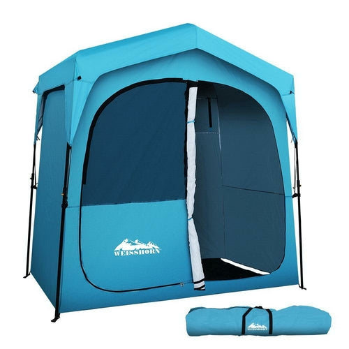 WIMINIS pop-up privacy tent in blue, set up outdoors for camping.