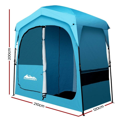 WIMINIS pop-up privacy tent in blue, set up outdoors for camping.