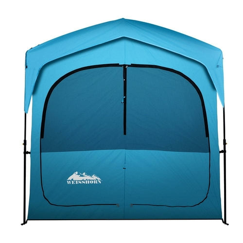 WIMINIS pop-up privacy tent in blue, set up outdoors for camping.